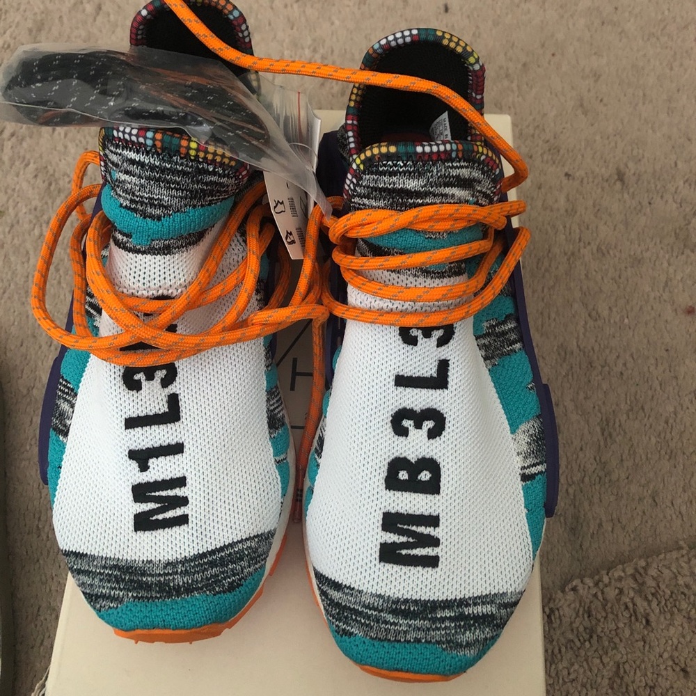 Adidas Human Races .... never worn.